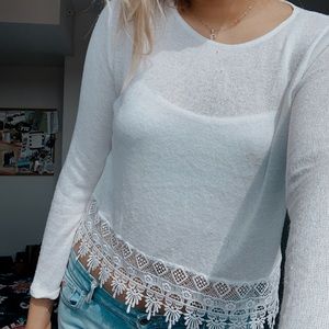Long sleeve shirts with details at the bottom